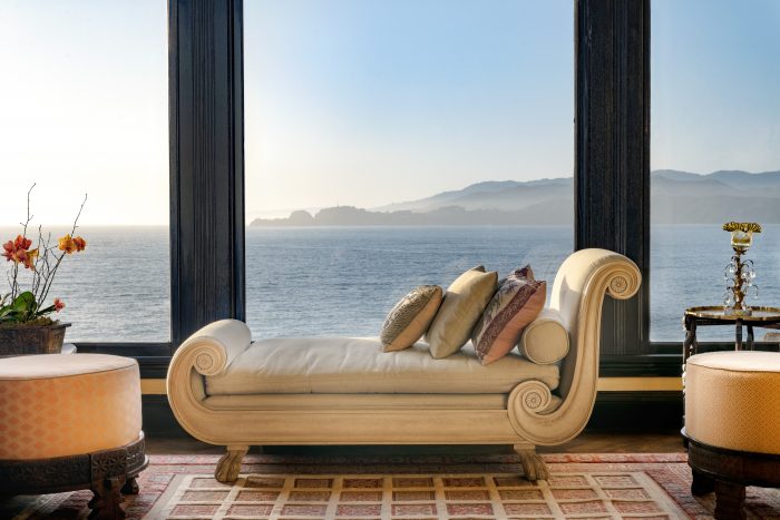 Fainting couch in front of window with Pacific ocean view