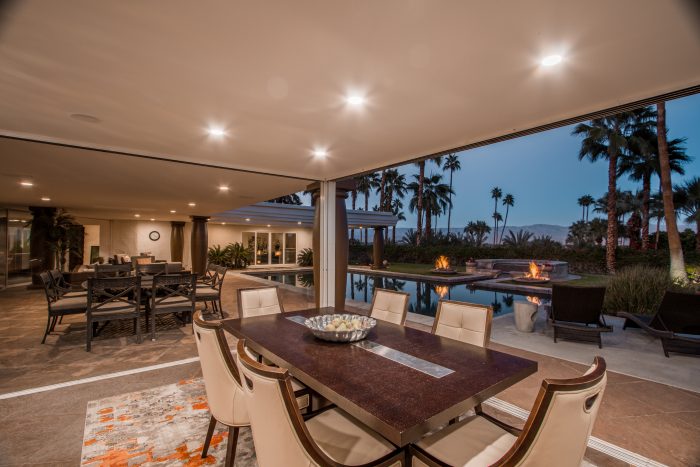 Bing Crosby Estate dining room open to patio with pool