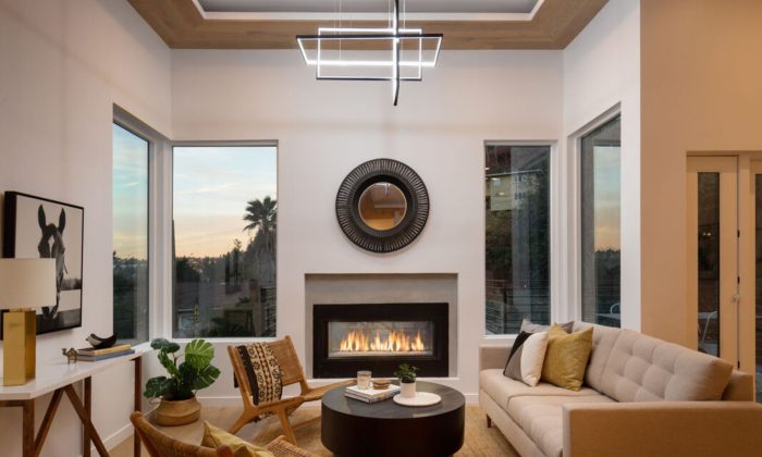 Livingroom with fireplace and window view at sunset