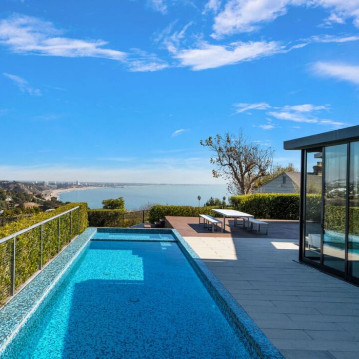 Deck picnic table pool ocean view