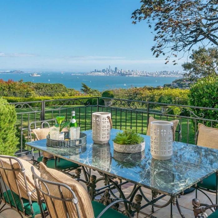 Outdoor table basket of Pierre water with lawn and view of San Francisco from across the bay in Sausalito
