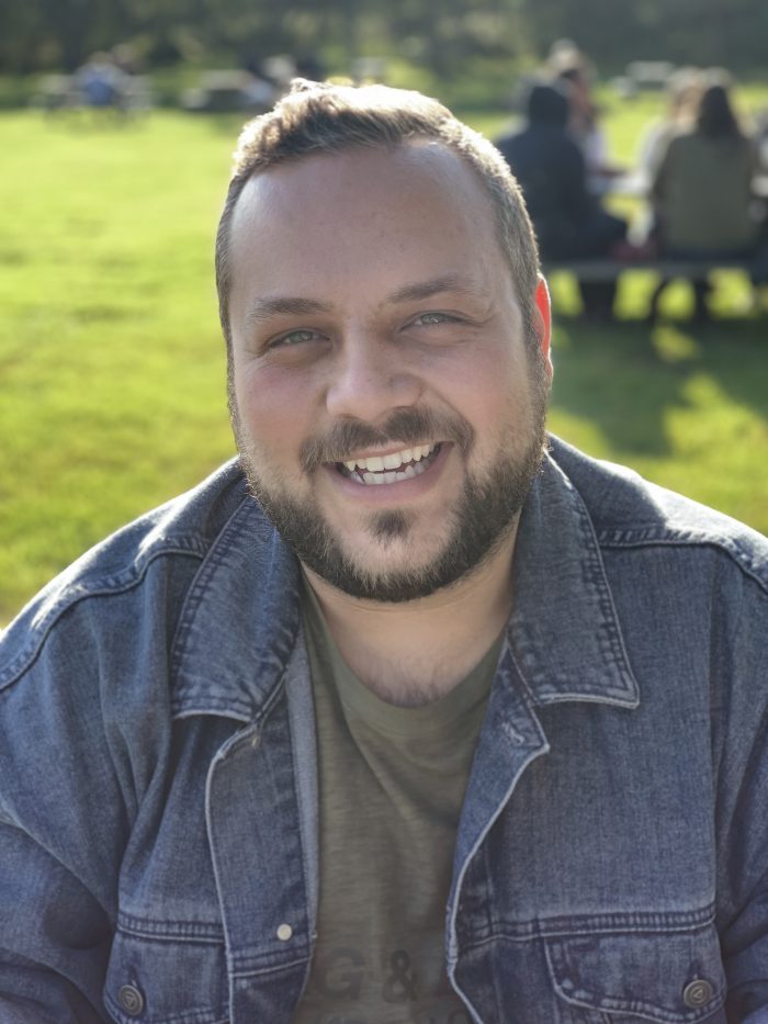 Casey Keenan picture - Man in denim jacket at the park.