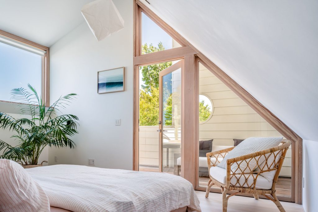 bedroom with angled windows