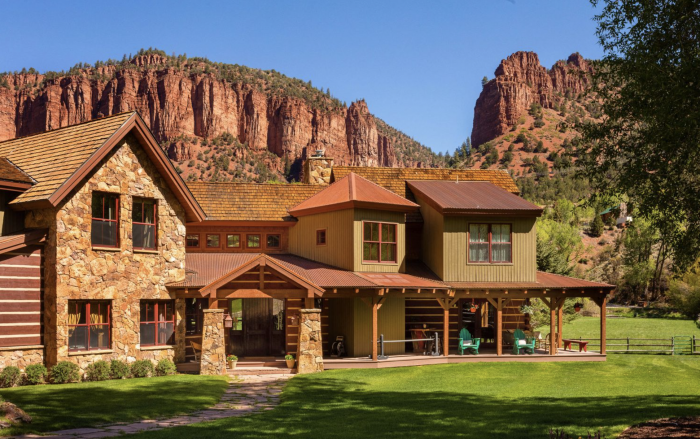 Mountain estate with mesa in the background