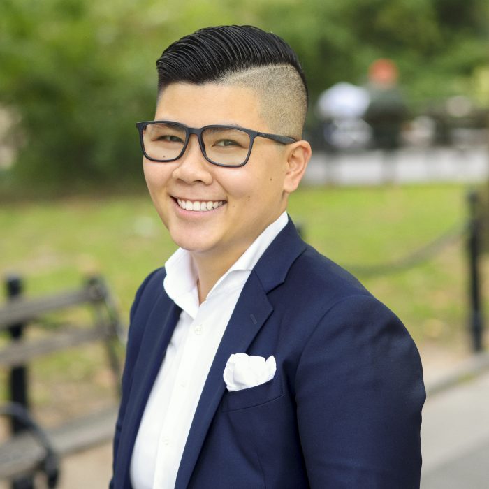 Zhou Chen, Real Estate Agent = Smiling person with greenery in the background