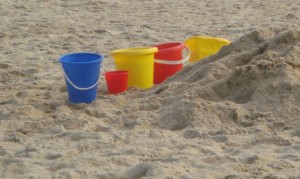beach Photo of plastic buckets on a beach