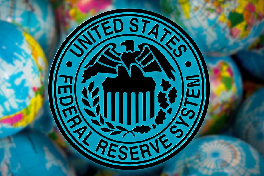 United States Federal Reserve System symbol (FED) on globe background,