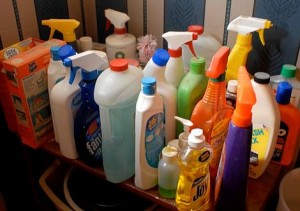 Shelf of home cleaning supplies