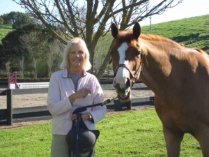 Photo of Marguerite Burbank and her horse Encore.