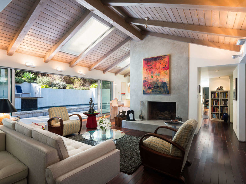 living room with fireplace and art Mandeville Canyon