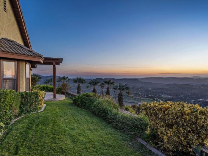 Property with view of Temecula at sunset palm trees in background